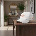Denver Inspired White Embroidered Dad Hat With DEN Logo And Football Icon