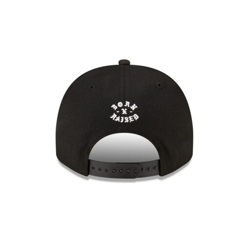 Detroit Lions Script Logo Snapback Cap in Black