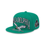 Philadelphia Eagles Oversized Wordmark Flying Eagle Side Patch Fitted Hat in Green