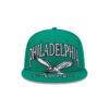 Philadelphia Eagles Oversized Wordmark Flying Eagle Side Patch Fitted Hat in Green 2 Philadelphia Eagles Oversized Philadelphia Wordmark Flying Eagle Side Patch Fitted Hat in Green